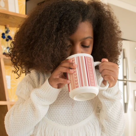 This colorful and playful heart mug is the perfect gift for a loved one.