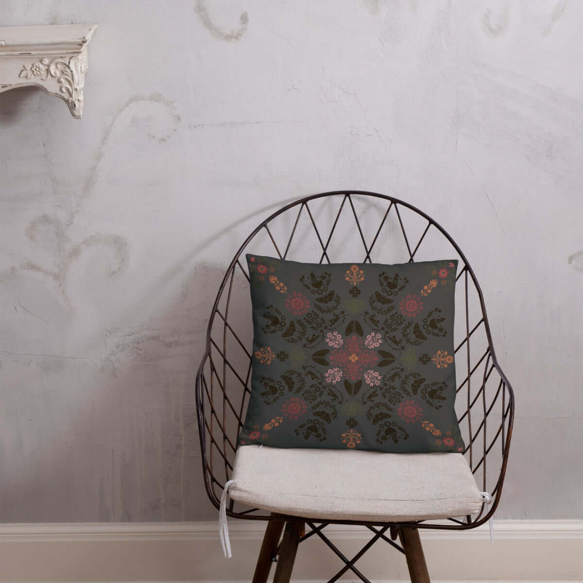 The dark whimsy floral throw pillow adds character to any accent chair