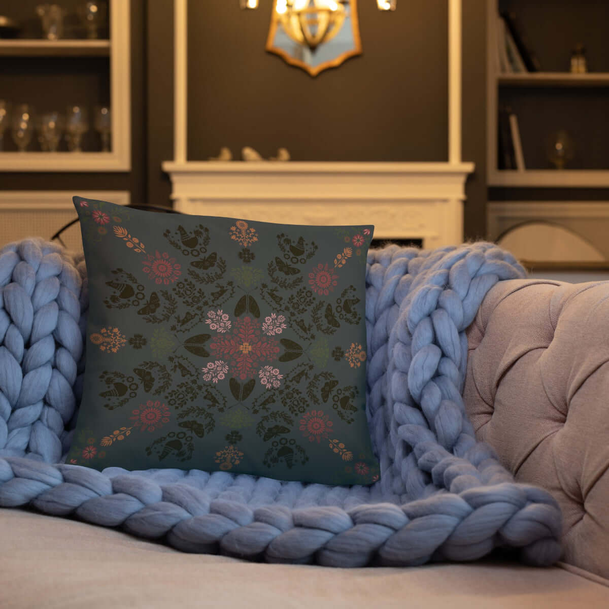 The Angela dark cottage whimsy throw pillow adds charm to the living room