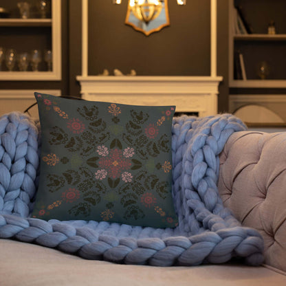 The Angela dark cottage whimsy throw pillow adds charm to the living room