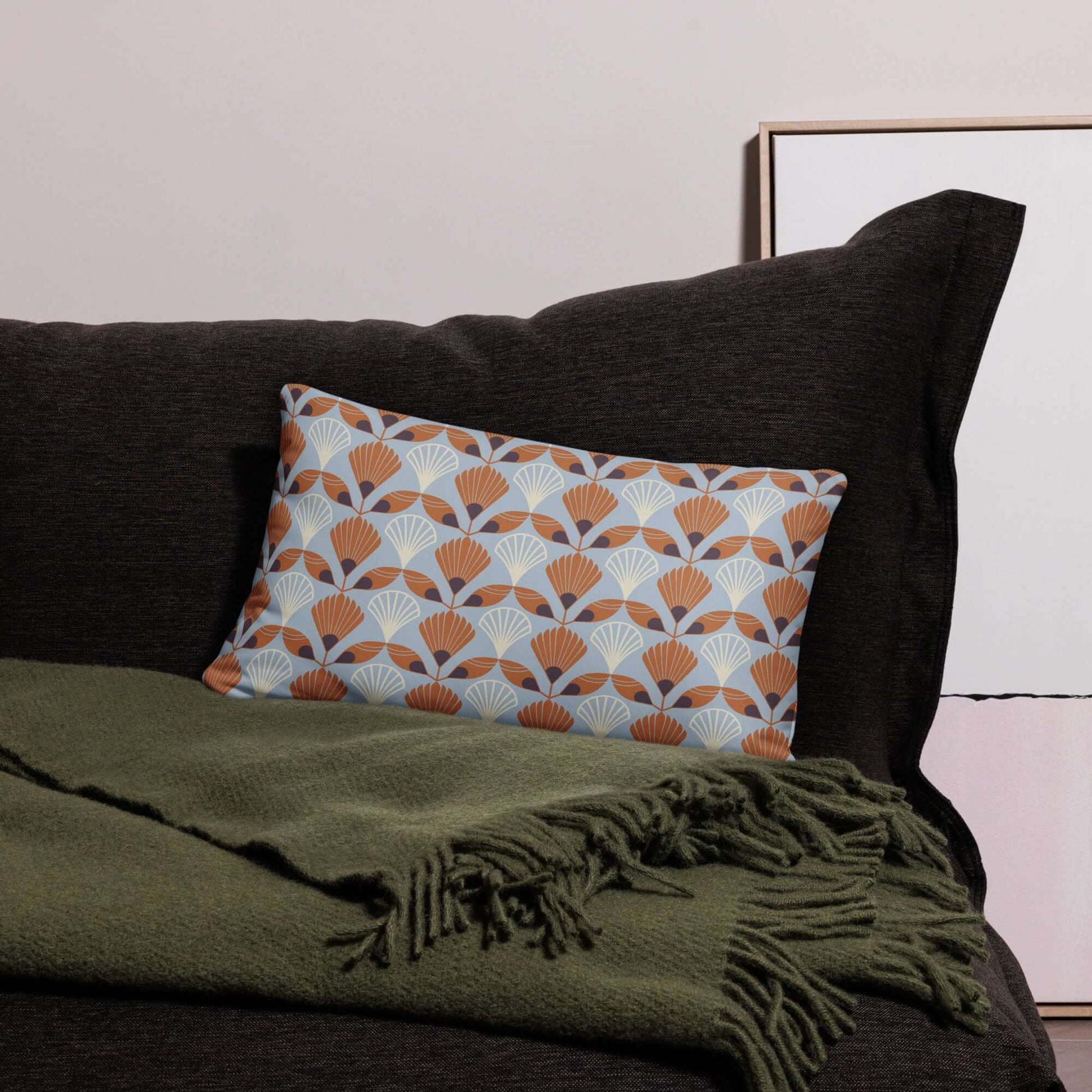 The soft and cozy Betty decorative lumbar throw pillow showcasing the beautiful colors of the design in a living room.
