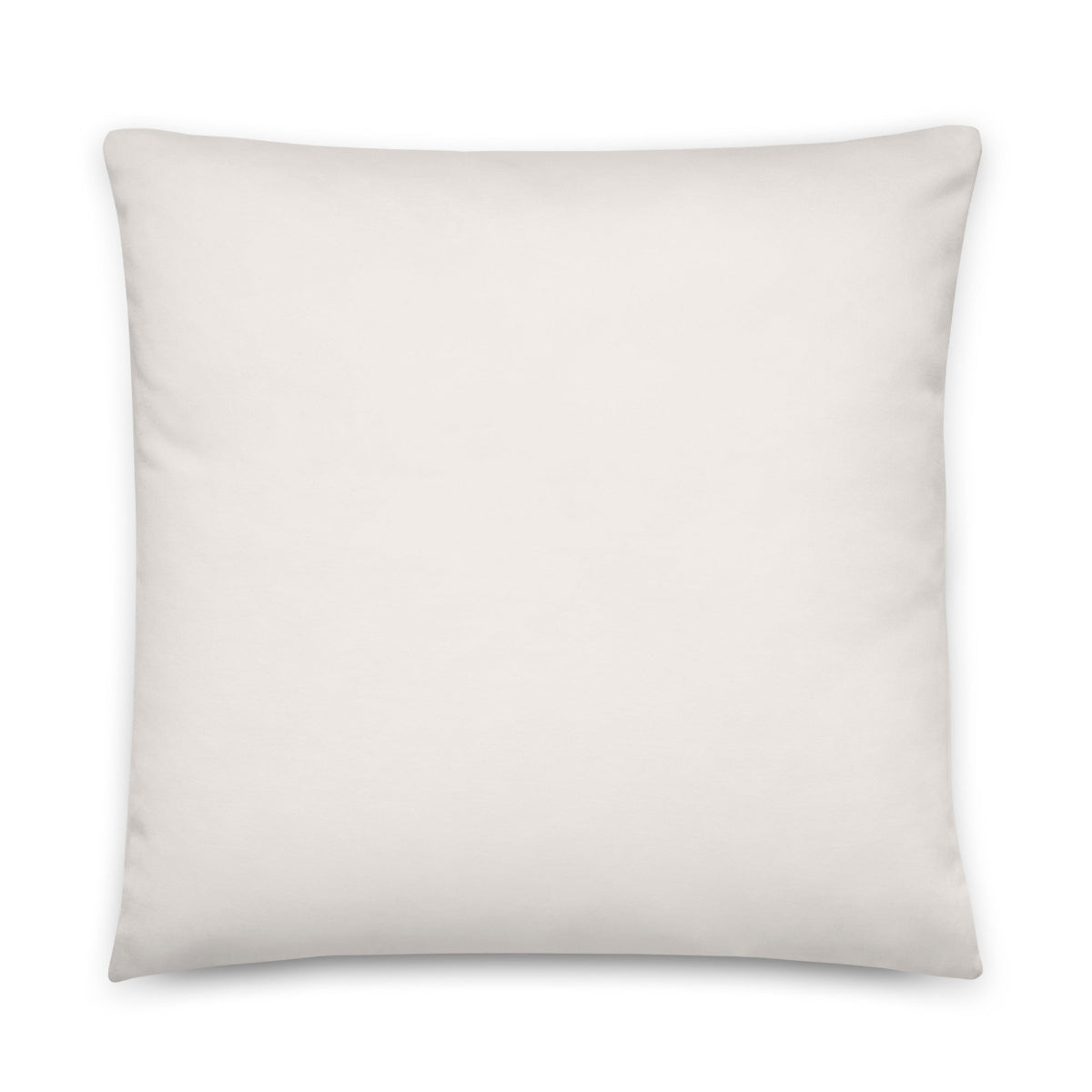 The reverse side of the Clara throw pillow is a solid milky white.