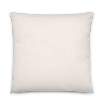 The reverse side of the Clara throw pillow is a solid milky white.