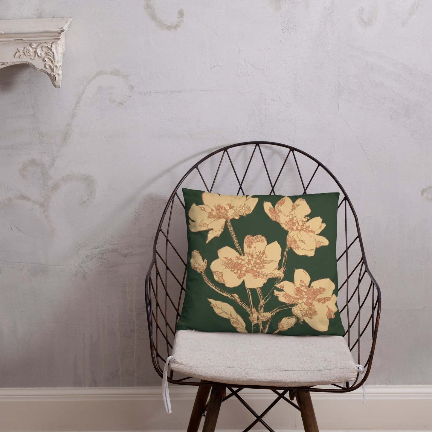 The Everlee green throw pillow with golden floral stems adds a whimsical yet elegant vibe to living rooms and bedrooms