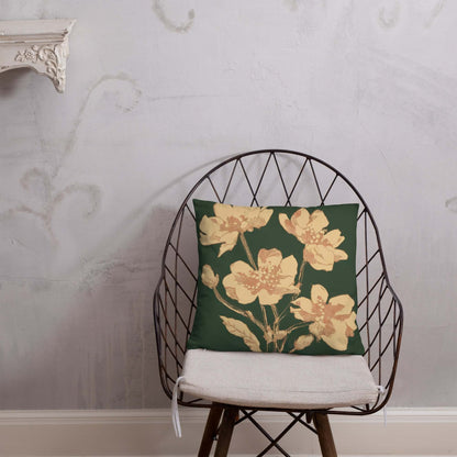 The Everlee green throw pillow with golden floral stems adds a whimsical yet elegant vibe to living rooms and bedrooms