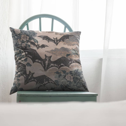 The Hilda goth throw pillow features bats flying in a Victorian style garden making this pillow a charming addition to any cottage style home decor or anyone who loves the mystical year round.