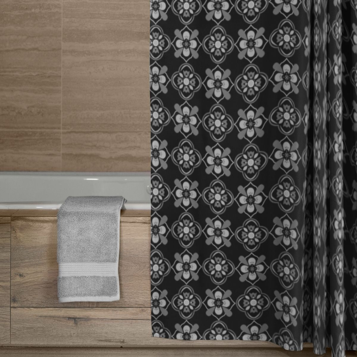 Decorative fabric shower curtain with a floral pattern in a bathroom.