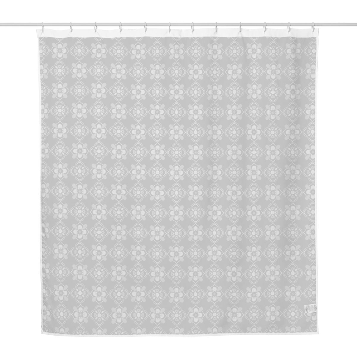 Shower curtain with geometric floral pattern on the front side and plain white on the reverse side.