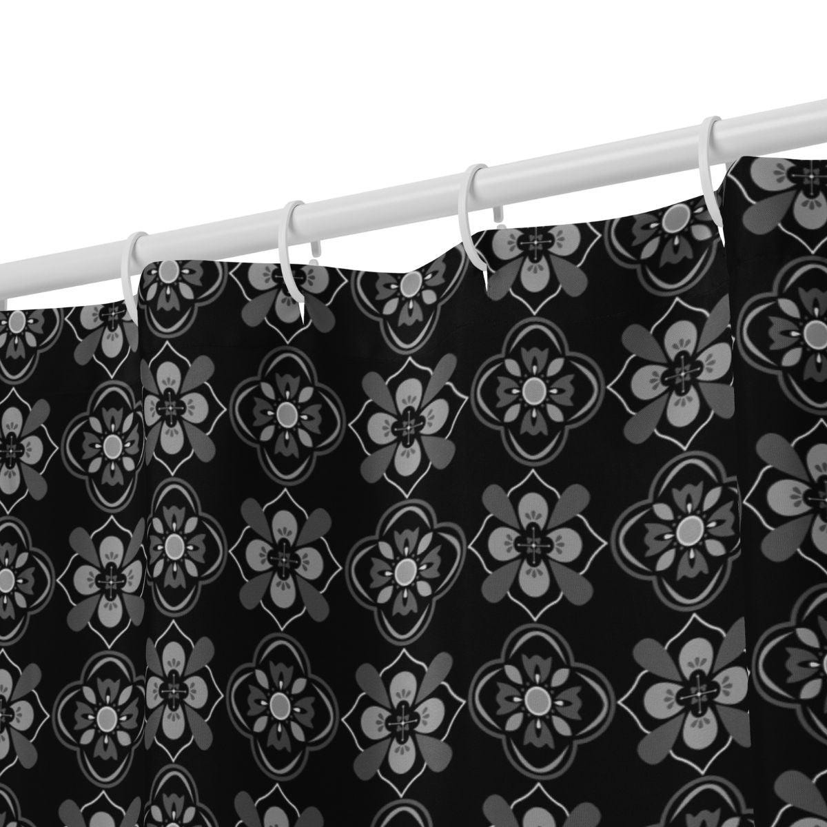Fabric shower curtain featuring a black and gray floral pattern, perfect for shower rings.
