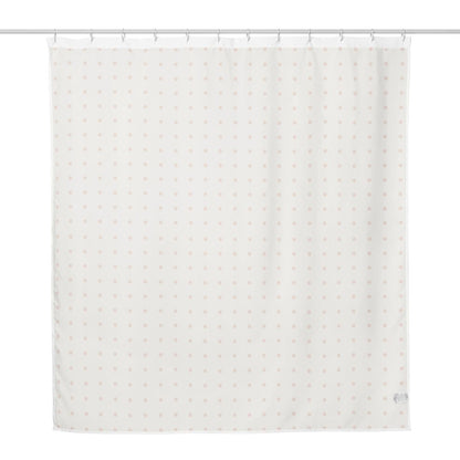 Backside of shower curtain with polka dot pattern on front side.