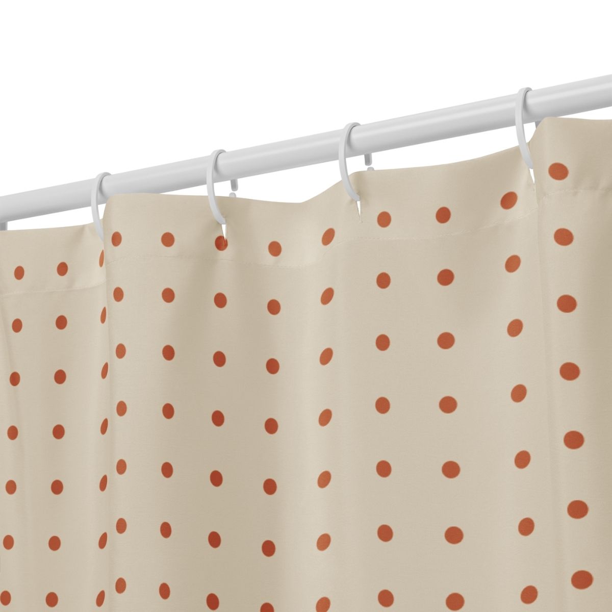 Beige shower curtain with orange polka dots with shower rings