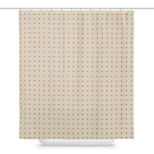 Shower curtain with a polka dot pattern on a beige background