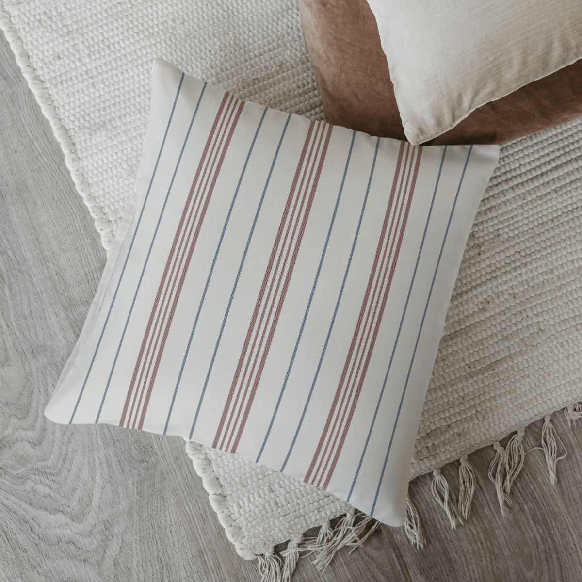 The Meadow striped rustic homespun decorative throw pillow is a great cushion for adding a cozy and charming feel to the home