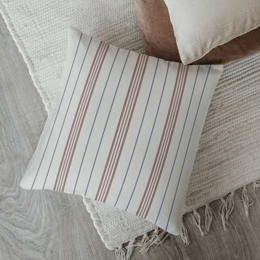 The Meadow striped rustic homespun decorative throw pillow is a great cushion for adding a cozy and charming feel to the home