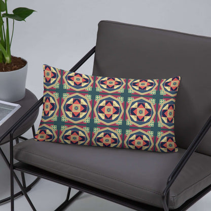 The Owen lumbar pillow is shown in a gray leather chair which allows for the bold colors of this pillow to pop.
