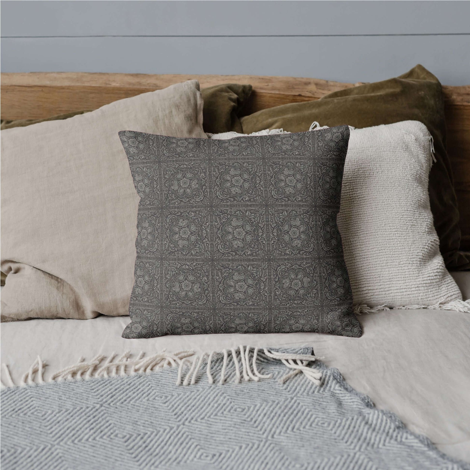 The rich throw pillow for bed features a floral pattern in green, adding a rustic charm to the bedroom