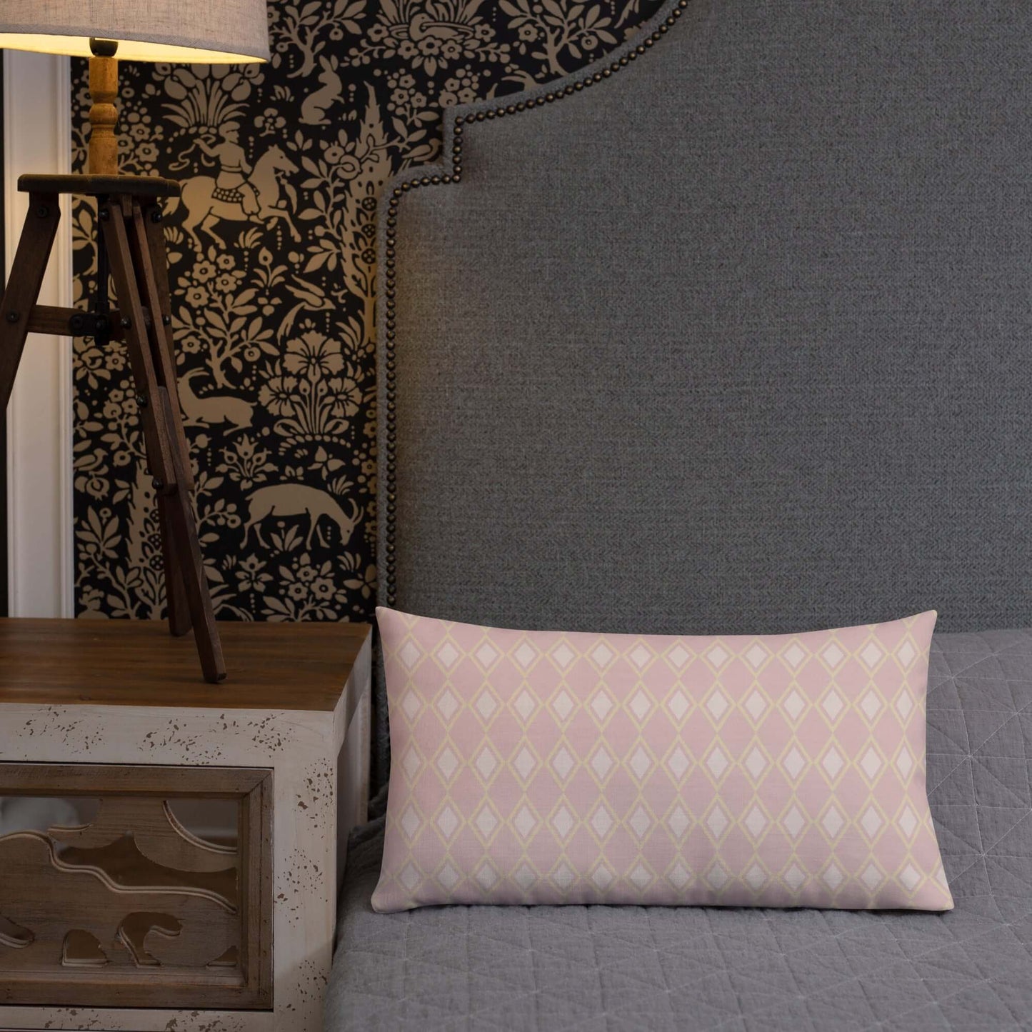 Girly apartment home decor Sabrina lumbar throw pillow with diamond pattern in shades of pink and soft yellow.
