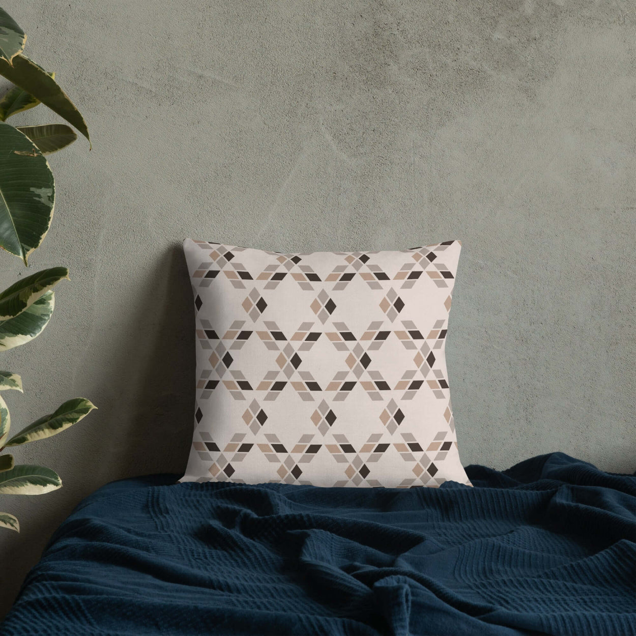 The Saige throw pillow with its rustic star design in neutral colors adds a cozy charm to the home