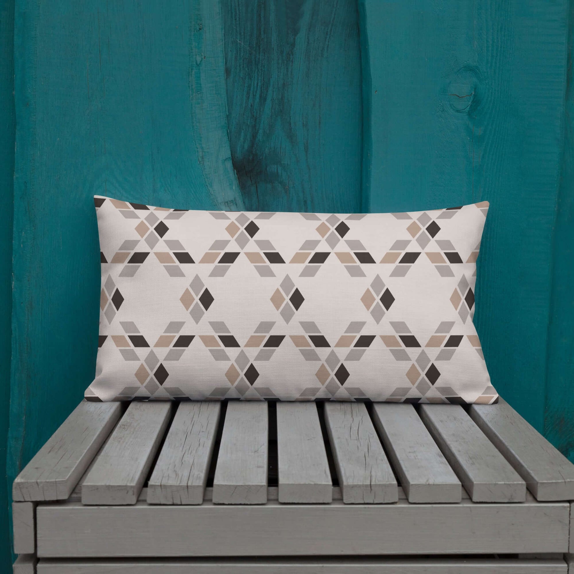 The Saige geometric lumbar pillow adds a neutral rustic vibe to a colorful patio