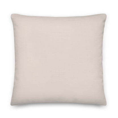 The back of the Saige pillow is a coordinating bone white color