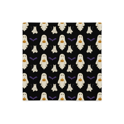 Halloween pillow cover with ghosts, cats, bats, and pumpkins against a black background.