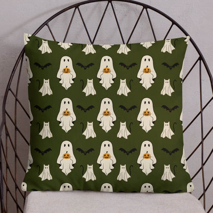 Decorative pillow with Halloween ghost pattern on a chair