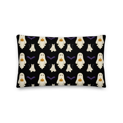 Pillow with Halloween ghost pattern on a black background