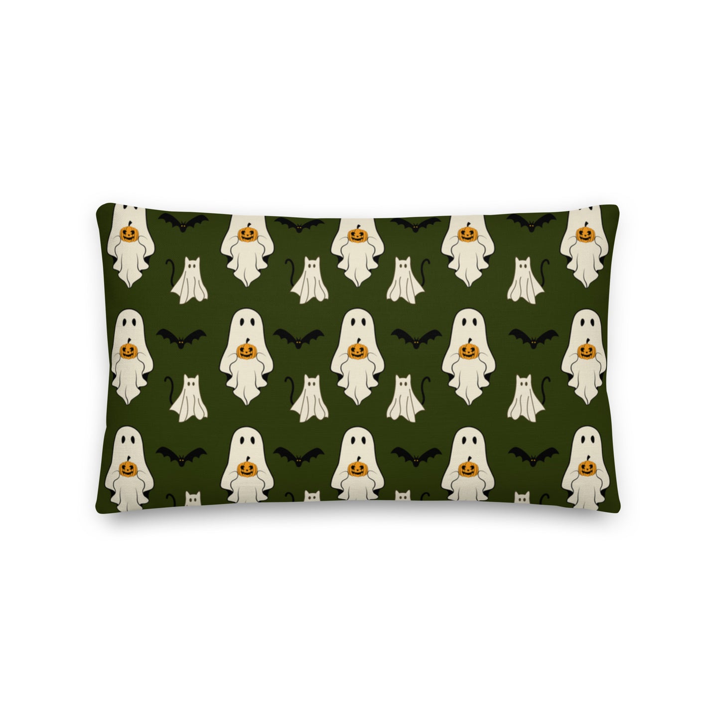 Pillow with Halloween ghost pattern on a green background