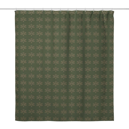 Green shower curtain with a subtle floral pattern on a white background