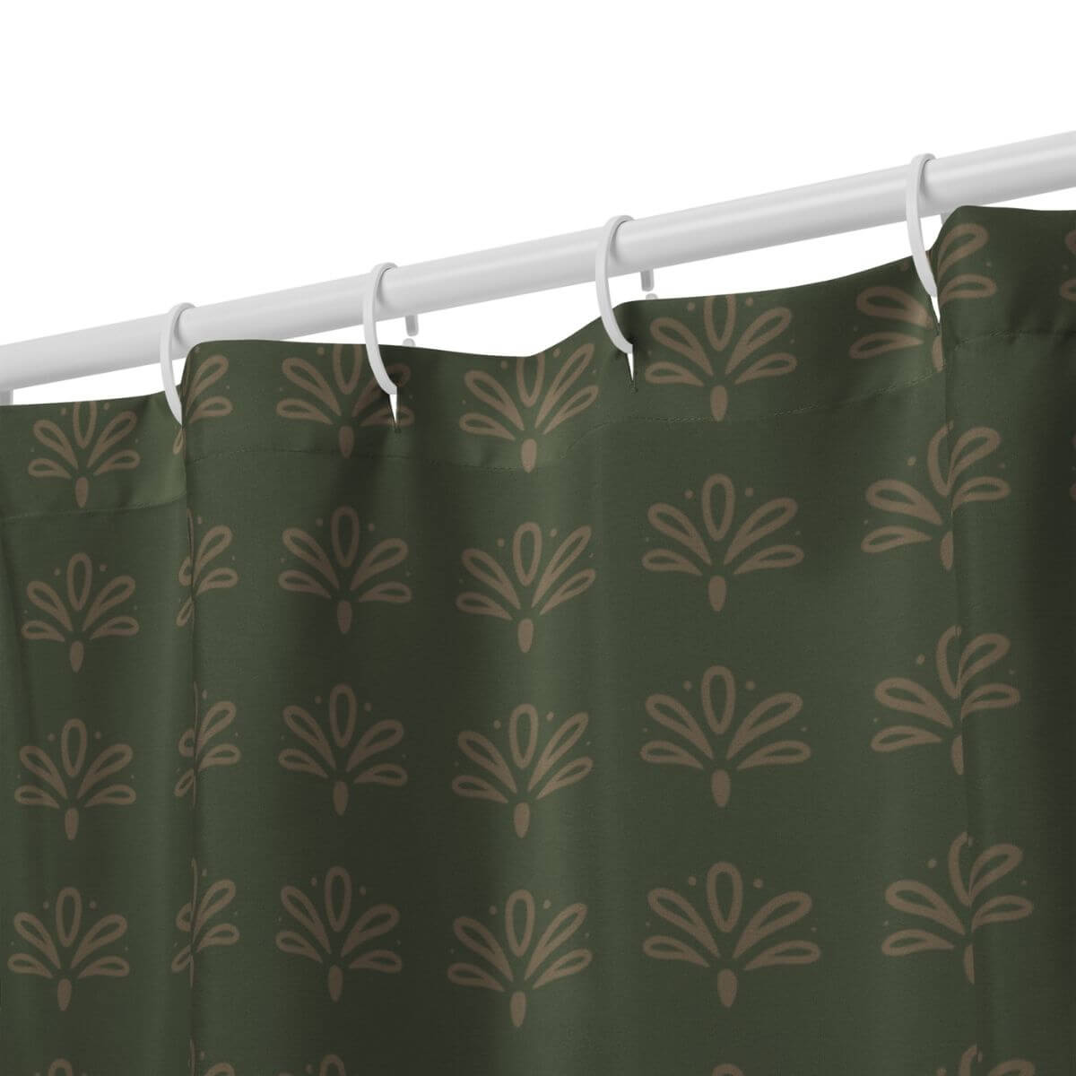 Green shower curtain with a floral pattern on a white rod