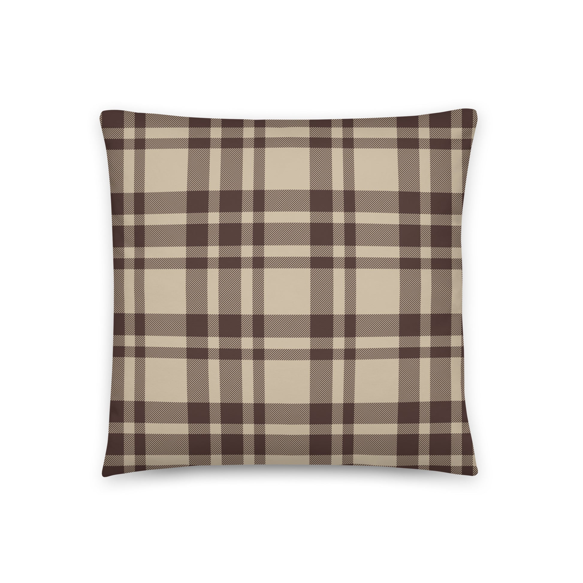 The Atticus throw pillow is shown from the back side which features a classic plaid design in chocolate brown and beige.