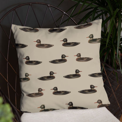 This pillow, shown in a metal framed chair with a dark background, is perfect for those who are looking to add a playful yet nostalgic vibe to their space.