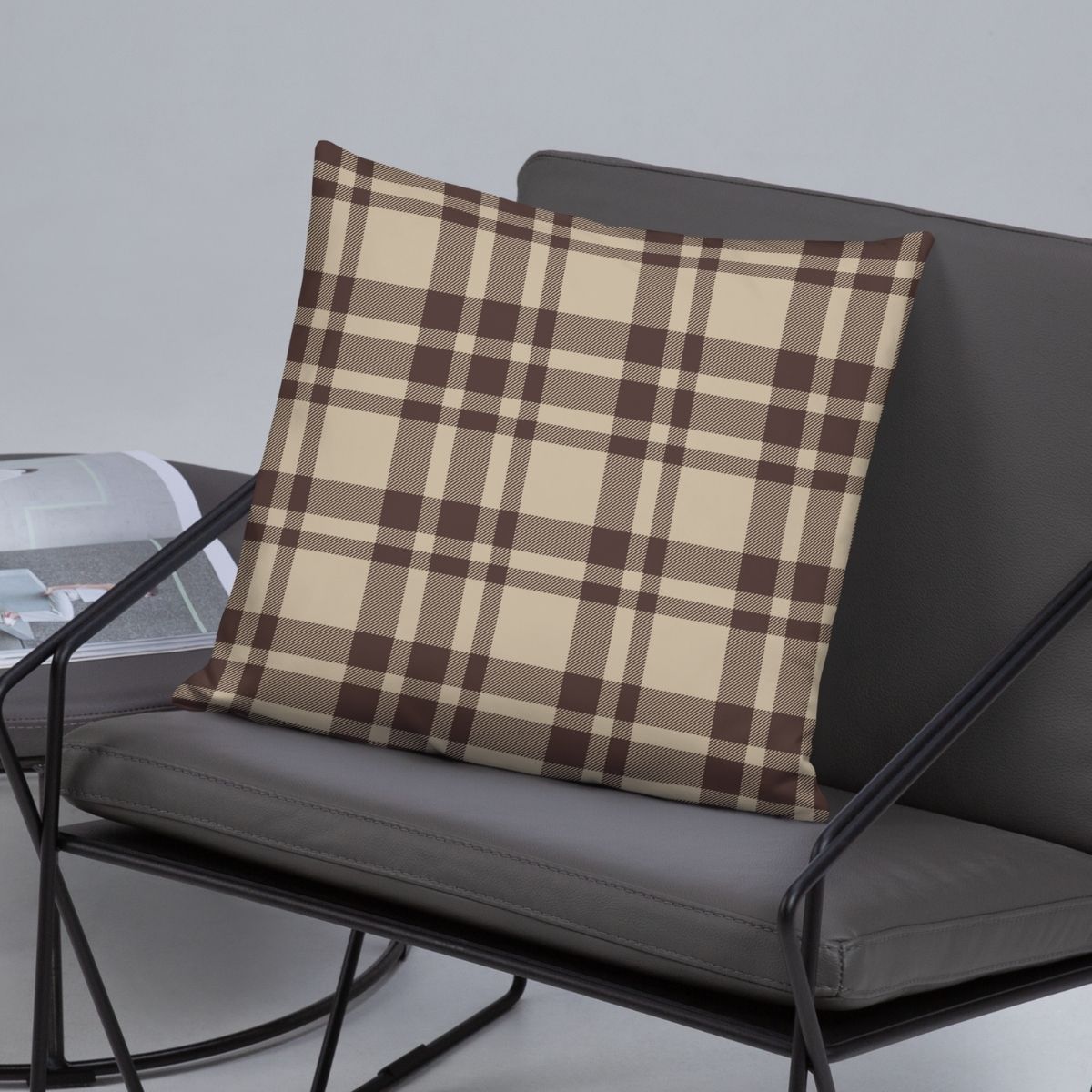 This pillow, shown on a modern metal chair, is perfect for those who are looking to add a bit of nostalgia into their home with a modern twist.