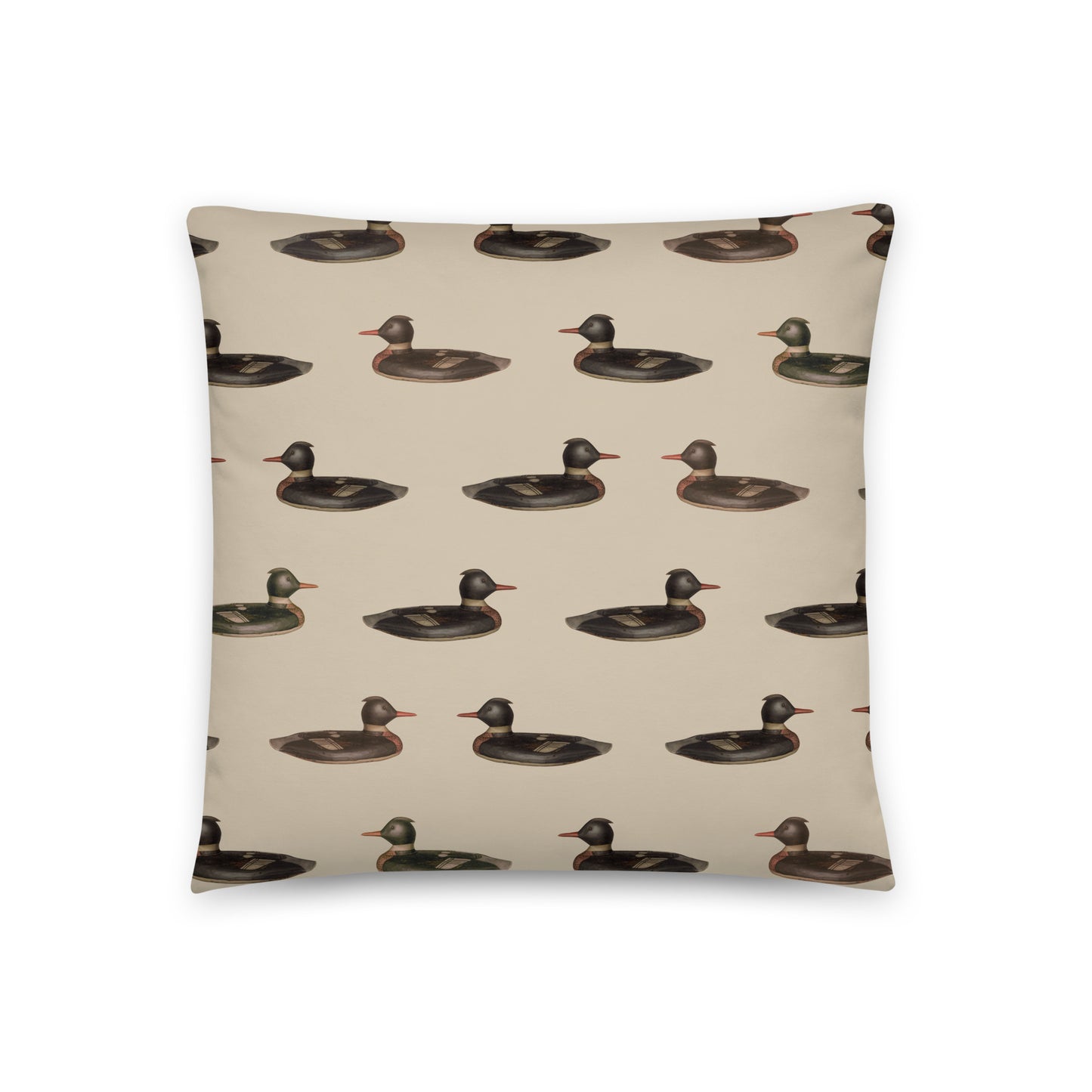 The front side of this pillow features a duck pattern, and the back showcases a classic plaid pattern. 
