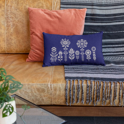 Cute little lumbar pillow with floral design in indigo and beige for home decot
