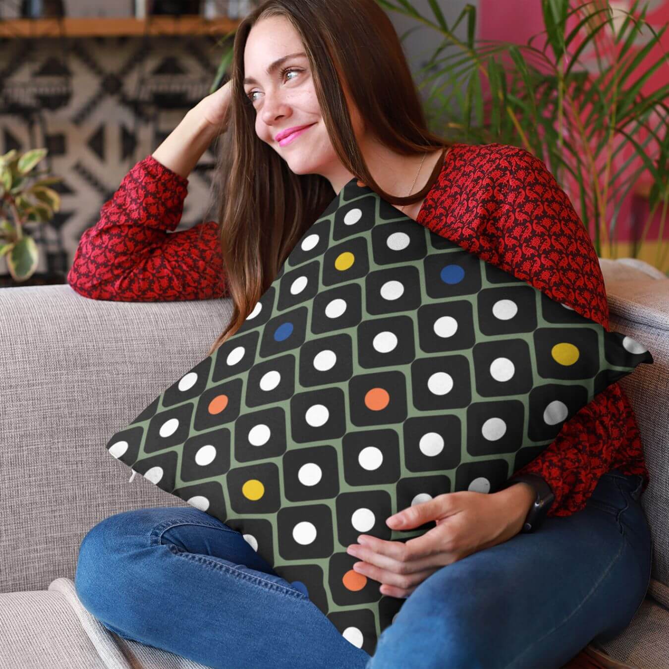 The Brooke square accent throw pillows for gray couch add a mid-century design to the living room.