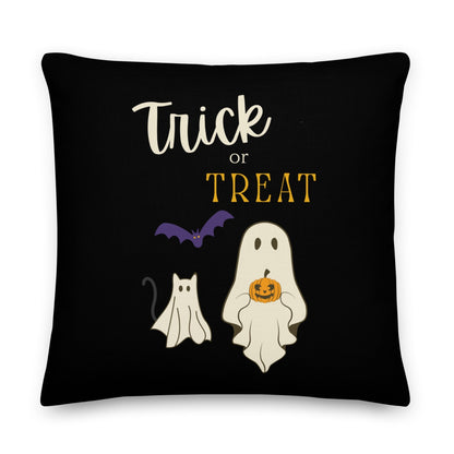 Black pillow with Halloween-themed design featuring ghosts, a bat, and 'Trick or Treat' text.