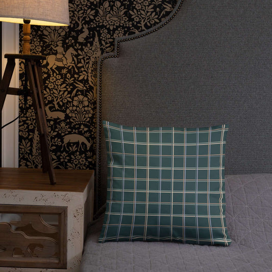 For a cozy and inviting feel to your bedroom, use the Glen pastel plaid over dark green pillow.