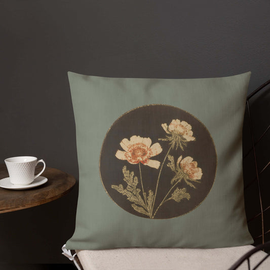 The Jade floral decorative throw pillow in a cozy tea room