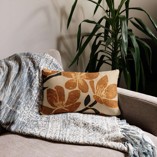 The kiva floral blossom lumbar pillow adds warms and beauty to a grey couch.