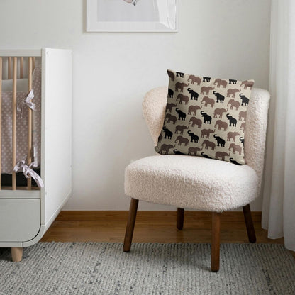 The Olivia pillow features playful elephants in a neutral tone making it perfect for baby nurseries and kids' rooms