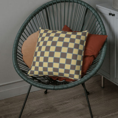 This decorative throw pillow features a checkered pattern in retro shades that bring joy to any room in the house or office.