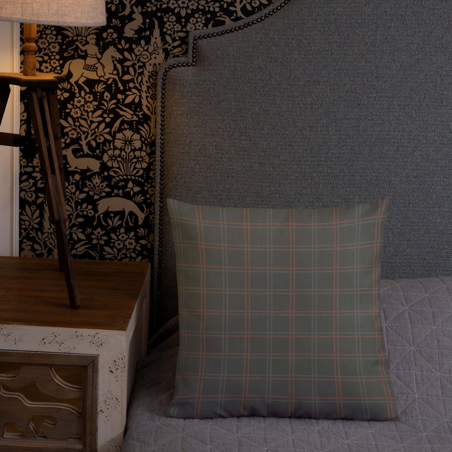 The Wyatt modern plaid pillow in green adds a touch of tradition to the bedroom