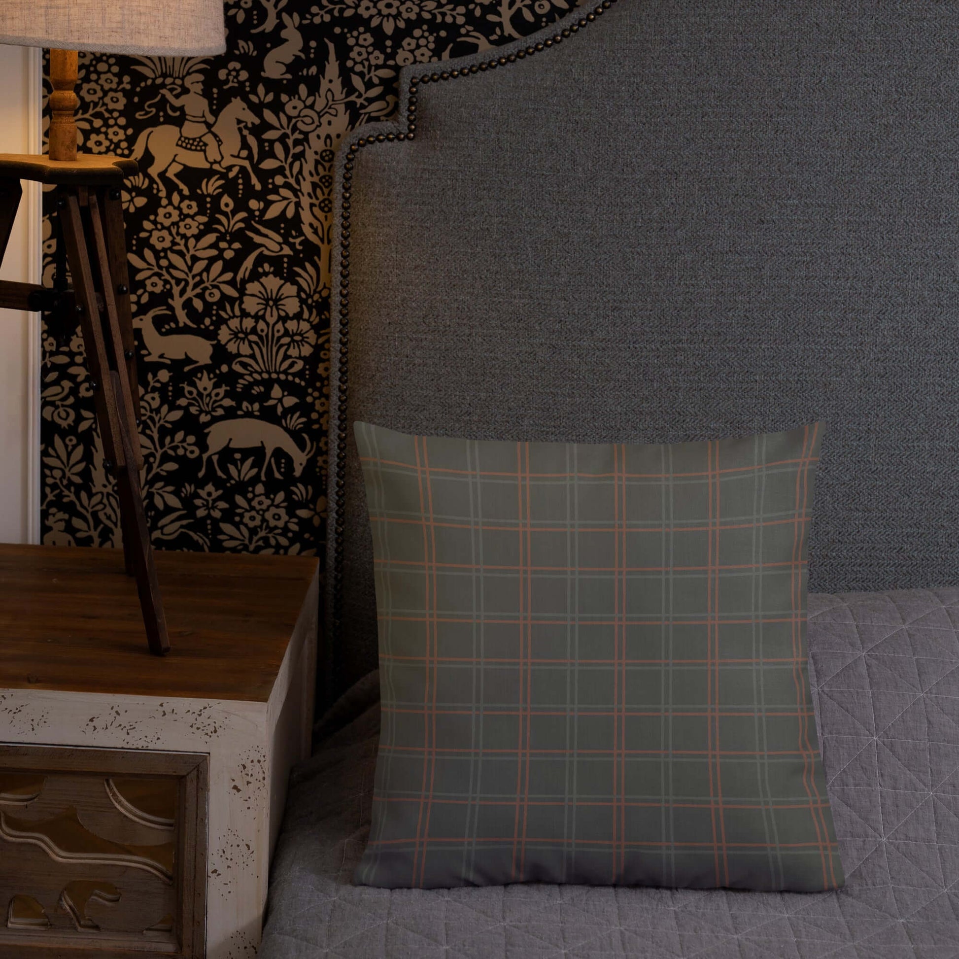 The Wyatt modern plaid pillow in green adds a touch of tradition to the bedroom